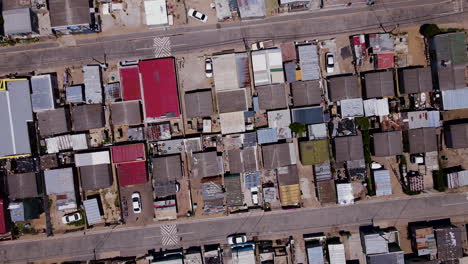 Rising-aerial-twisting-shot-over-ghetto-township-in-South-Africa