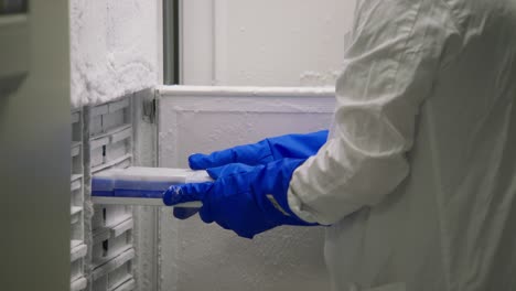 Scientist-Examining-Blood-Samples-in-a-Laboratory-Freezer