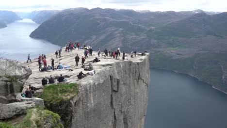 Preikestolen-view-with-people-on-the-rock-close-to-Stanvanger