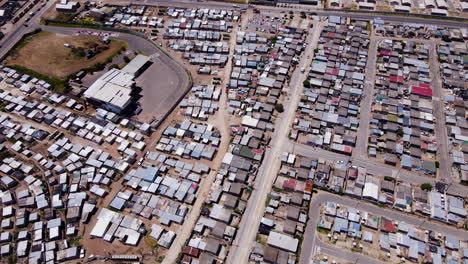 Aerial-over-township-with-lots-of-makeshift-houses---urban-sprawl-in-Hermanus