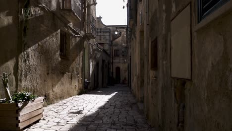 Matera,-Italy-Alley-with-sun-beam