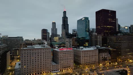 Aerial-view-revealing-the-Congress-Plaza-Hotel-and-Convention-Center,-cloudy-evening-in-Chicago,-USA