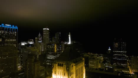 Ceres-statue-on-top-of-the-Board-of-Trade,-night-in-Chicago,-USA---Aerial-view