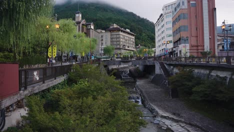 Gero-Onsen-in-the-early-morning,-Mist-in-the-mountains-of-Gifu-Japan
