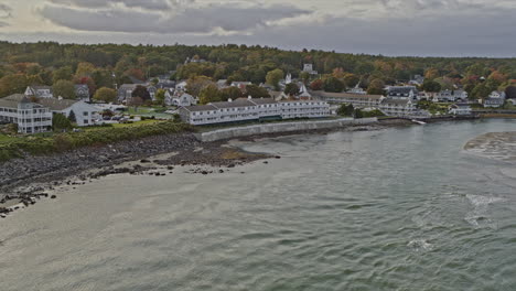 Ogunquit-Maine-Aerial-v5-low-level-flyover-rocky-shores-capturing-beautiful-townscape-with-beach-views-and-sun-shinning-on-river-water-surface---Shot-with-Inspire-2,-X7-camera---October-2021