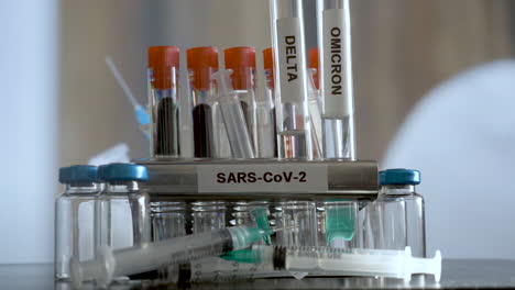 SARS-COV-2-Test-Tubes-Labelled-Alpha-Gamma-Delta-Beta-And-Omicron-Being-Removed-From-Rack