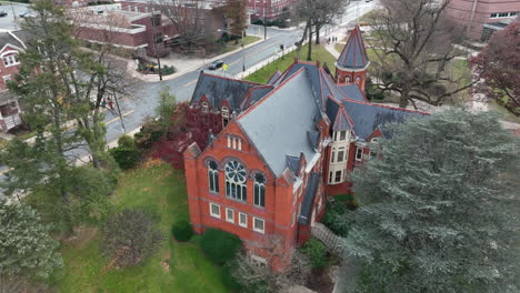 Red-brick-gothic-mansion-building-with-slate-roof