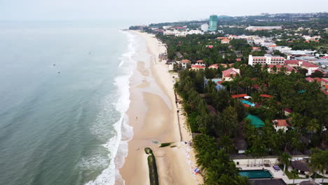 Aerial-panorama,-Vietnam-beach-with-coastal-erosion-caused-by-rising-sea-levels