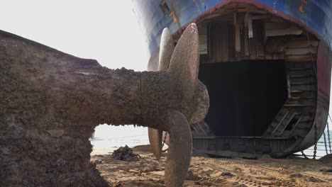 Side-View-Of-Large-Rusted-Ship-Propeller-At-Gadani-Ship-Breaking-Yard