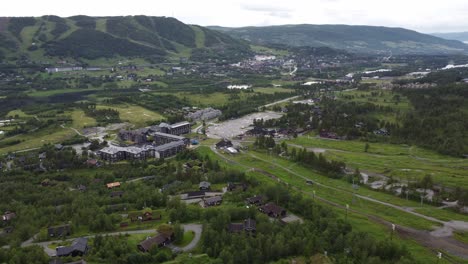 Geilo-in-Hallingdal-Norway---Aerial-summer-overview-showing-vacation-homes-and-hotels-with-green-grass-in-skiing-slopes