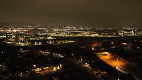 Silicon-Slopes-in-Lehi,-Utah-at-night---push-forward-aerial