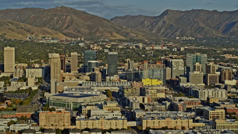 Salt-Lake-City-Utah-Aerial-v27-elevation-drone-fly-up-shot-capturing-downtown-cityscape-with-beautiful-rocky-wasatch-mountain-in-the-background---Shot-with-Inspire-2,-X7-camera---October-2021