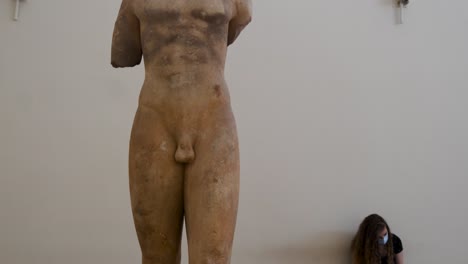 Marble-statue-of-Kroisos-Kouros-,-found-at-Anavyssos,-Attica,-National-Archaeological-Museum-Athens,-Greece-on-10-14-2021