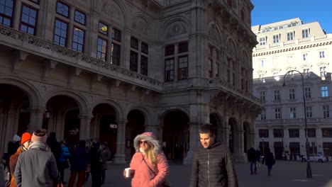 People-taking-a-stroll-during-sunny-weather-in-Vienna,-Austria