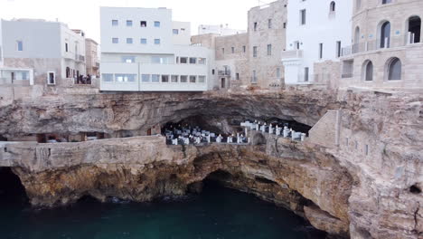 Grotta-Palazzese,-Famous-Restaurant-On-A-Natural-Cave-In-Polignano-a-Mare,-Puglia,-Italy