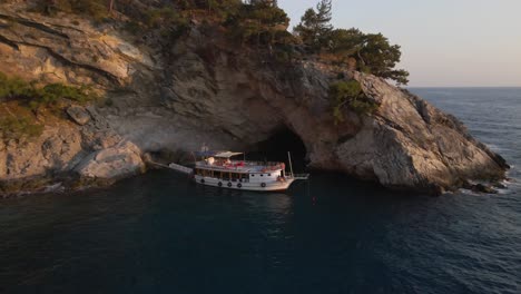Aerial-view-of-luxury-fancy-boat-anchored-in-a-bay-in-Ölüdeniz-southwest-coast-of-Turkey