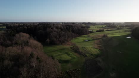 Rural-Landscape-Aerial-View,-Beautiful-Golf-Course-in-Denmark-Markusminde-Golf-Club---Dolly-In-Shot-and-Panning-Shot