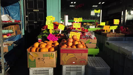 Wide-shot-of-a-fruit-and-vegetable-stall-on-Danforth-Avenue-in-Toronto
