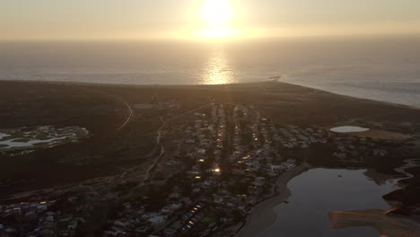 Beautiful-Sunrise-In-The-Horizon-From-Armona-Island-In-Portugal---aerial-shot