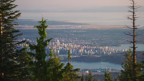 Aerial-view-of-Vancouver-City,-British-Columbia,-Canada,-From-North-Vancouver-in-4K