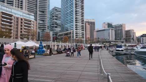 View-of-the-port-of-Zaitunay-Bay-with-tourists-walking-around-and-enjoying-place-BEIRUT,-LEBANON---Jan-01-2022