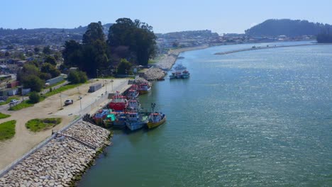 port-of-constitucion-boat-trips-and-fishing-of-fishermen-maule-city-of-constitucion-region-of-maule,-talca-santiago-de-chile-drone-shot