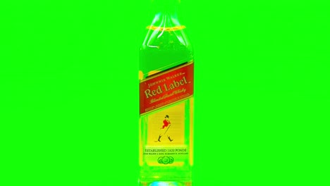 the-arrestable-taste-of-the-leading-whiskey-scotch-blend-of-alcohol-most-popular-worldwide-for-its-exquisite-flavor-the-Johnnie-Walker-Red-Label-miniature-bottle-for-a-quick-drink-on-the-run-revealed