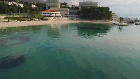 Aerial-Reveal-Of-Beachfront-Hotel-And-Spa,-Marina-Lav---Split,-Croatia