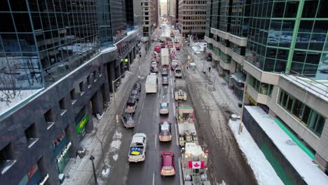 Drone-Shot-of-Freedom-Trucker-Rally-on-Slater-Street-in-Ottawa,-ON-Jan-30,-2022,-during-the-Covid-19-Pandemic