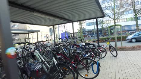 Fast-camera-movement-behind-parked-bycicles-in-germany