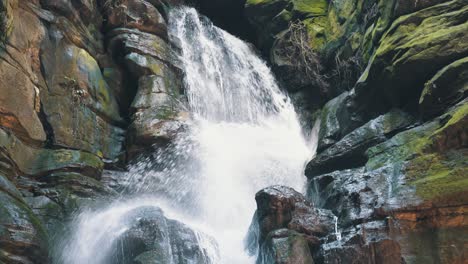 Waterfall-rock-wall-moss-close-up-shot