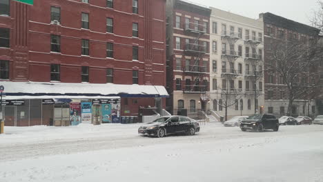 Car-Spins-Tires-In-Snow-On-New-York-City-Street-In-Heavy-Snow