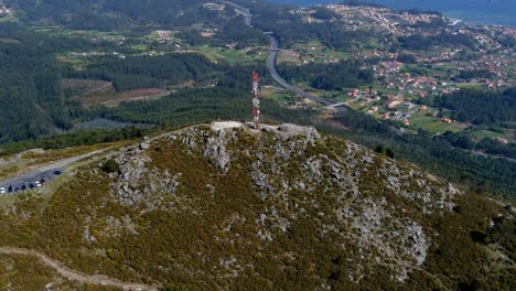 Aerial-View-Of-Telecommunications-Mast-On-Rocky-Hillside-In-Miradoiro-da-Curota