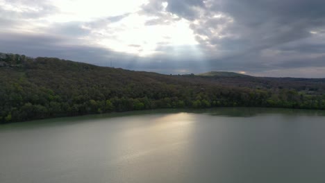 Sunlight-Burst-on-Mountain-Lake