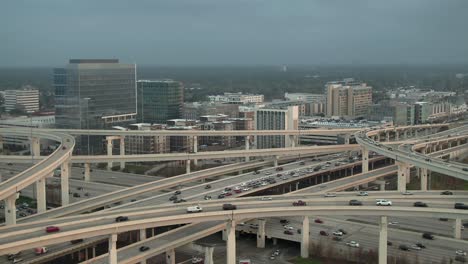 Aerial-of-cars-on-I-10-West-freeway-in-Houston,-Texas