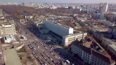 Drone-flight-over-the-campus-of-the-Technical-University-of-Berlin-with-a-view-of-the-Tiergarten,-Bahnhof-Zoo,-Straße-des-17