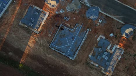 Rising-overhead-aerial-shot-of-foundation-of-new-home-construction