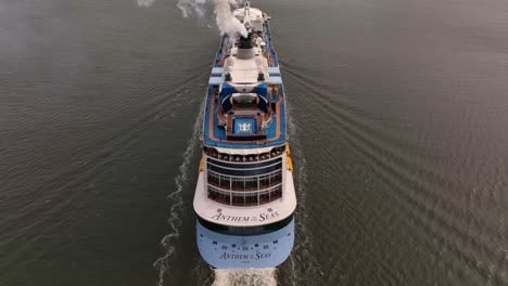 An-aerial-shot-of-Royal-Caribbean's-Anthem-of-the-Sea-sailing-away-on-a-cloudy-day