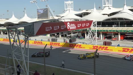 Start-of-"8-Hours-of-Bahrain"-race,-sport-cars-drive-on-the-track