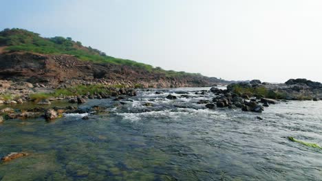 Low-angle-aerial-shot-of-river-stream-at-Narmada-Vadodara