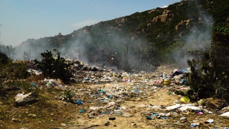 Burning-garbage-at-landfill-in-Vietnam-causing-air-pollution,-global-warming-concept