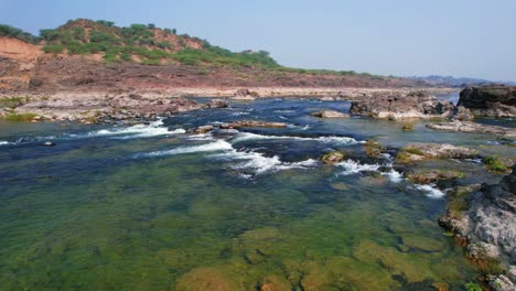 Drone-shot-of-beautiful-natural-scenery-of-Narmada-river,-Gujrat,-India-in-Southeast-Asia
