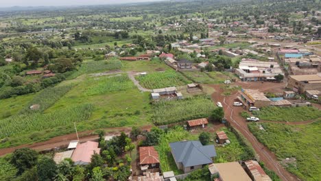 Farms-on-rural-suburbs-of-Loitokitok-town-in-Southern-Kenya,-aerial-panorama