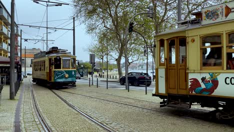 Panning-shot-of-famous-electrico-tram-in-Porto-in-slow-motion---Portugal,Europe