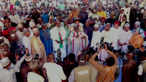 A-political-candidate-speaks-to-the-crowd-and-a-campaign-rally-in-Damaturu,-Nigeria