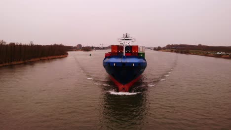 Forward-Bow-View-Of-JSP-Carla-Cargo-Ship-Travelling-Along-Oude-Maas-On-Cloudy-Day