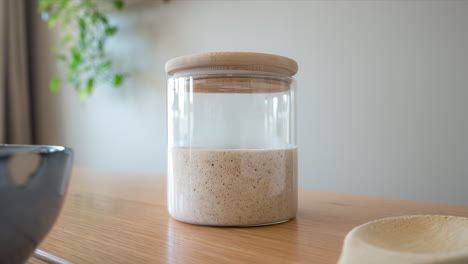 Sourdough-Starter-Left-To-Ferment-On-Tight-Glass-Jar