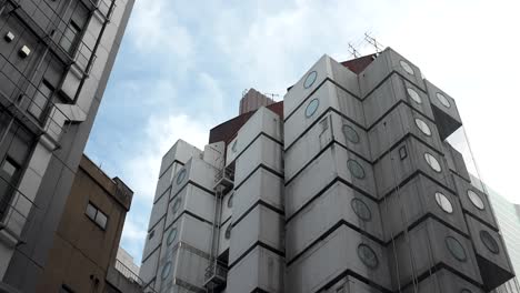 Demolition-works-continue-at-Tokyo's-iconic-Nakagin-Capsule-Tower-in-Ginza-on-April-16,-2022,-in-Tokyo,-Japan