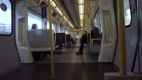 Inside-View-Looking-Along-Carriage-On-London-Underground-S8-Stock-Metropolitan-Line-Train-On-12th-May-2022