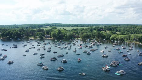 Aerial,-lake-crowded-with-party-motor-boats-during-college-spring-summer-break